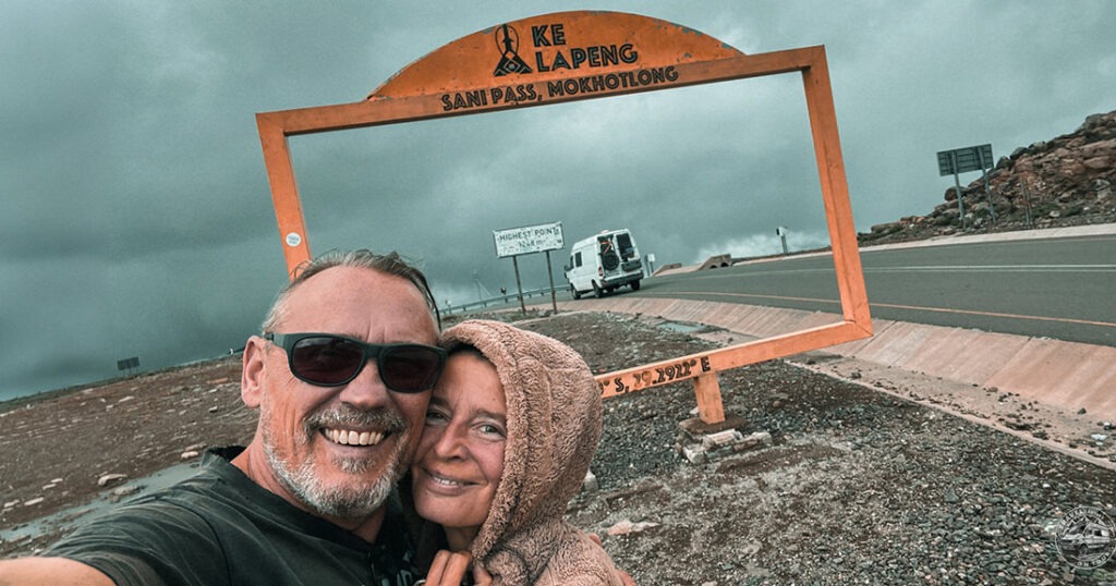 Fenny and Totti standing beside their 2004 Mercedes Sprinter 4x4 during their overland journey across Africa.
